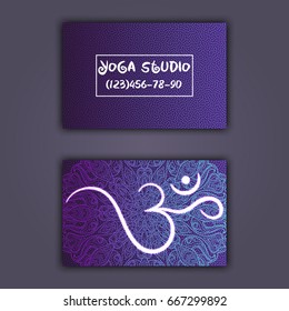 Business card for yoga studio or yoga instructor. Ethnic background with mandala ornament and ohm.