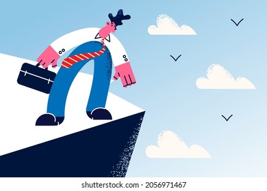 Business challenge and danger concept. Young businessman wearing suit and tie cartoon character standing on edge of abyss with danger and risks vector illustration