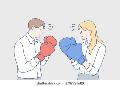 Business competition, challenge, fighting, rivalry concept. Young people businessman and woman office clerks managers fighting with boxing gloves.