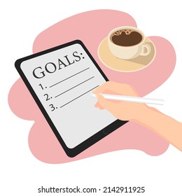 business concept, action plan for the coming year. fulfillment of goals and objectives. writes goals over a cup of coffee