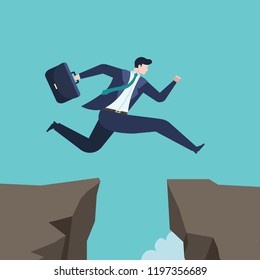 Business concept of businessman Jumping over the abyss. Challenges and success