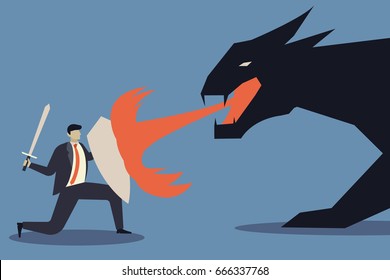 Business concept of businessman uses a shield to protect the dragon fire.