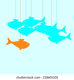 Business Concept With Goldfish Moving Against Stream Breaking Common Rules In The Form Of Puppet Thread That Holds It And Does Not Allow To Achieve Aims And Other Fish Moving As Puppets On Thread