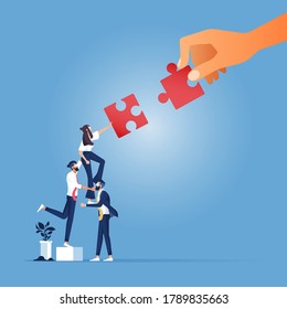 Business concept. Teamwork metaphor. Business team connecting puzzle elements. Combining two pieces. Symbol of working together, cooperation, partnership.