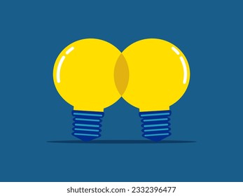 Business cooperation. two light bulbs working together 