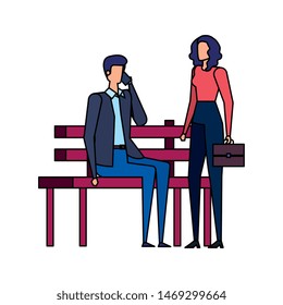business couple calling with cellphone in the park chair