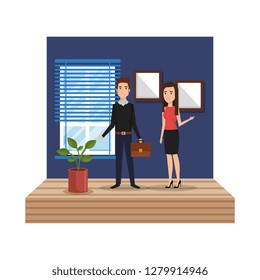 business couple in the workplace corridor