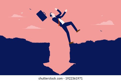 Business crisis - Businessman tripping and falling into gap in the shape of an arrow pointing down. Trouble and misfortune concept. Vector illustration.