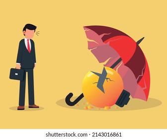 Business crisis and default concept. sad frustrated businessman standing looking at broken light bulb under a broken umbrella.