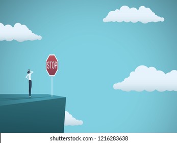 Business dangers for woman vector concept. Businesswoman standing on the edge of cliff with warning stop sign. Symbol of danger, failure, bankruptcy, recession and crisis. Eps10 vector illustration.