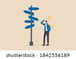 Business decision making, career path, work direction or choose the right way to success concept, confusing businessman looking at multiple road sign with question mark and thinking which way to go.