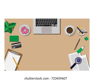 Business desk with laptop, notepad, notebook, credit card, coffee, working paper and other office materials with  copy space for your text