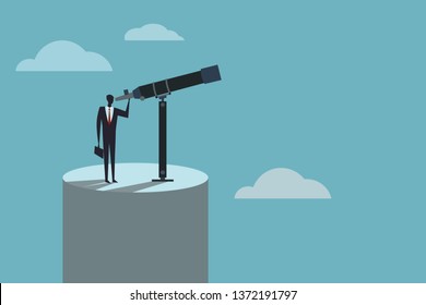 Business  executive looks through a telescope. Concept for vision.