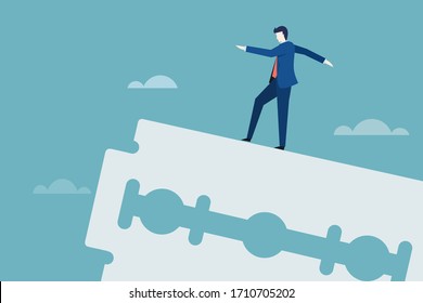 Business executive walks on the edge of a razor blade. Concept for moving ahead with risks and challenges