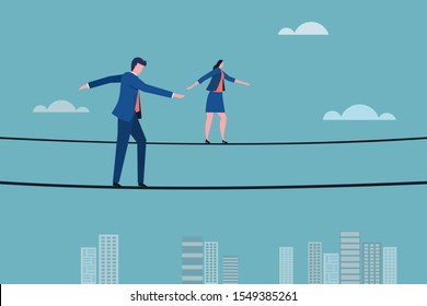 Business Executives Walking On A Tight Rope. Concept For Moving Ahead With Risks And Challenges