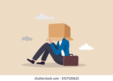 Business failure, work mistake or misfortune and unlucky, bankruptcy or fail entrepreneur concept, depressed businessman sitting covered his head with box, shameful cannot face people or society.