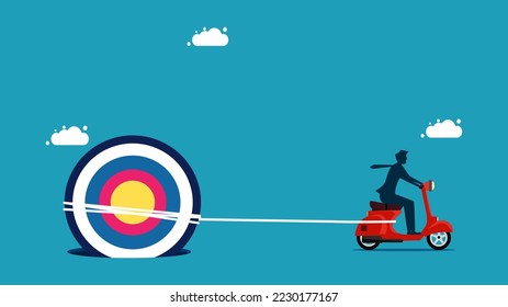 business goals. Businessman pulls to get the target out of the pitfall