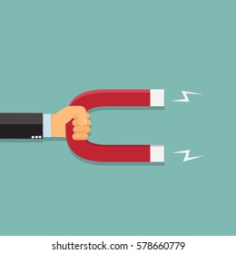 Business hand holding magnet  - vector illustration