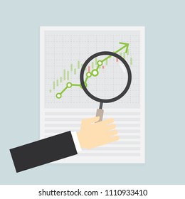 Business hand Magnifying glass to analytics with graph on data paper, Investment Success concept