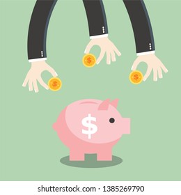 Business hands insert money and coin into the piggy bank. Saving and investing money.
