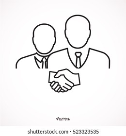 Business handshake between two men, associates or friends