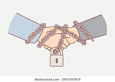 Business handshake between two partners with hands chained and locked, as sign of guaranteeing fulfillment of agreements. Corporate employees handshake instead of signing contract.