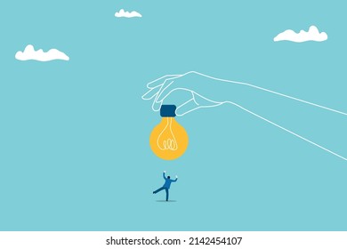 Business idea or business creativity concept with businessman standing in front of a huge light bulb and looking on it. hand holding light bulb. Eps10 illustration