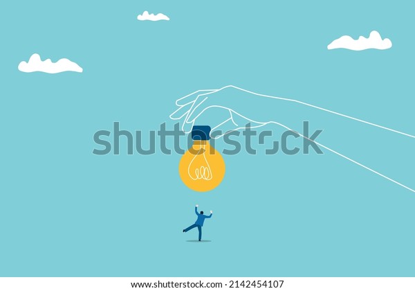 Business idea or business\
creativity concept with businessman standing in front of a huge\
light bulb and looking on it. hand holding light bulb. Eps10\
illustration