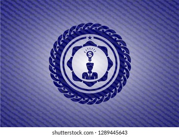 business idea icon inside badge with denim texture