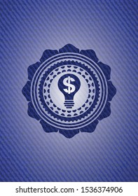 business idea icon inside badge with denim texture