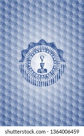 business idea icon inside blue polygonal badge.