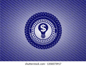business idea icon inside emblem with denim texture