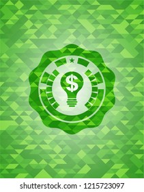business idea icon inside green mosaic emblem