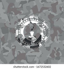 business idea icon inside grey camo emblem