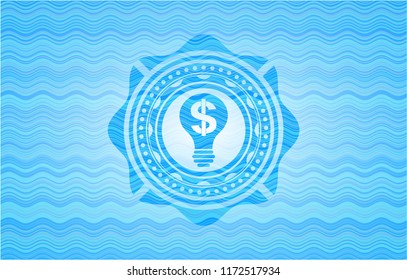 business idea icon inside light blue water wave badge background.