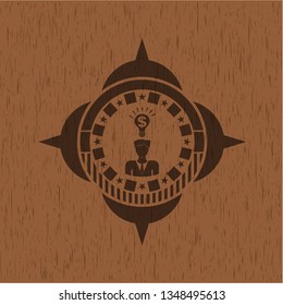 business idea icon inside realistic wood emblem
