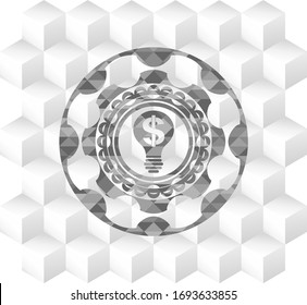 icono de idea de negocio dentro de emblema gris realista con fondo blanco cubo geométrico