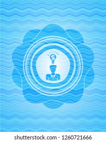 business idea icon inside sky blue water wave badge.