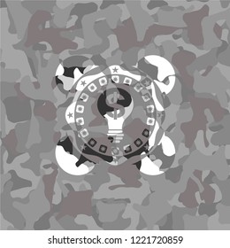 business idea icon on grey camouflaged pattern