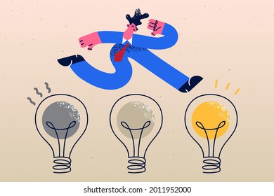 Business innovation, transformation, change management concept. Positive confident businessman jumping from old to new shiny lightbulb idea turning to innovative business