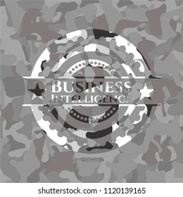 Business Intelligence written on a grey camouflage texture