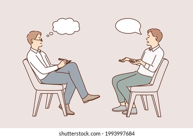 Business Interview And Head Hunting Concept. Young Man Job Seeker Sitting Answering Questions Of Recruiter Looking At Him And Making Notes In Notepad Vector Illustration 