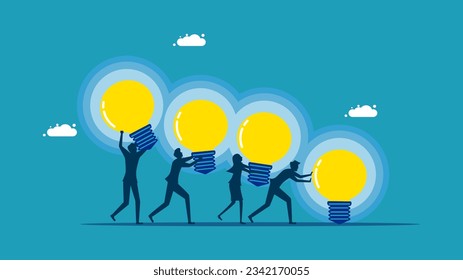 Business knowledge. business team working together to push light bulb 
