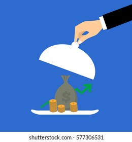 Business life hand opens serve cloche with money concept