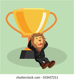 business lion relaxing with trophy