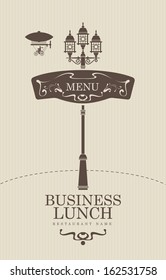 business lunch menu with vintage lamp and airship