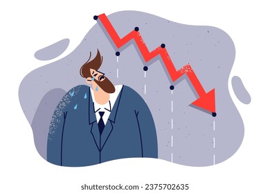 Hombre de negocios llorando y mirando hacia abajo sintiéndose estresado por perder dinero o inversión. La caída del gráfico rojo es una metáfora de la crisis financiera y la disminución de los ingresos por inversiones en la creación de empresas