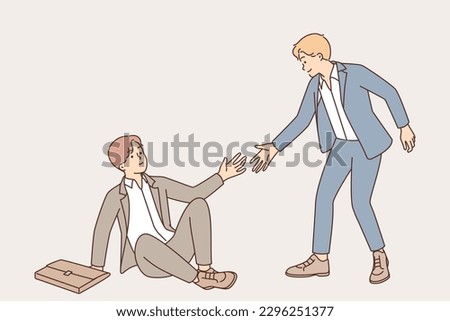 Business man extends hand to fallen partner to help colleague get up in difficult situation. Concept of assisting employees in need of help and care for staff of company or business partners