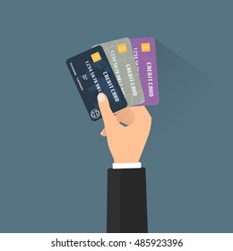 Business man hand with multiple credit cards for paying out with long shadow. Vector illustration business concept design.