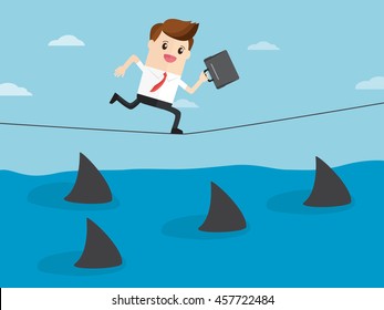 business man have courage running on rope over a sea of sharks